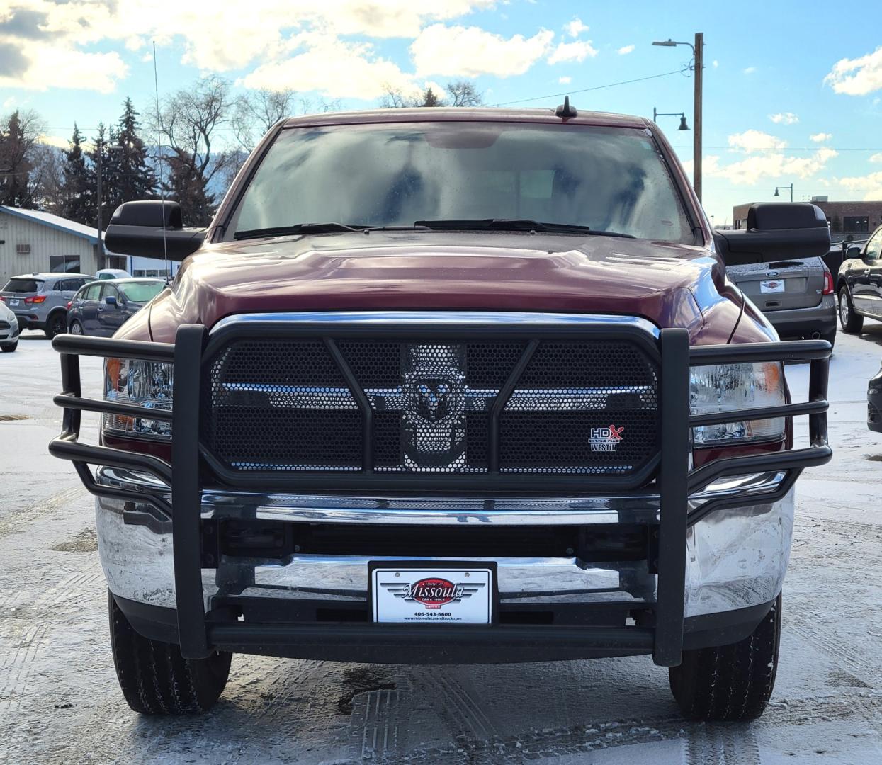 2018 Maroon /Black RAM 2500 SLT (3C6UR5DL4JG) with an 6.7 L Cummins Turbo Diesel engine, 6-Speed Automatic transmission, located at 450 N Russell, Missoula, MT, 59801, (406) 543-6600, 46.874496, -114.017433 - Only 12,839 Miles. Mint Condition/ 4 Wheel Drive. 6.7L Cummins Turbo Diesel. 6 Speed Automatic Transmission. Matching Topper. Touchscreen Display. AM FM Bluetooth. Power Drivers Seat. Air. Cruise. Tilt. Power Windows and Locks. Backup Camera. - Photo#4